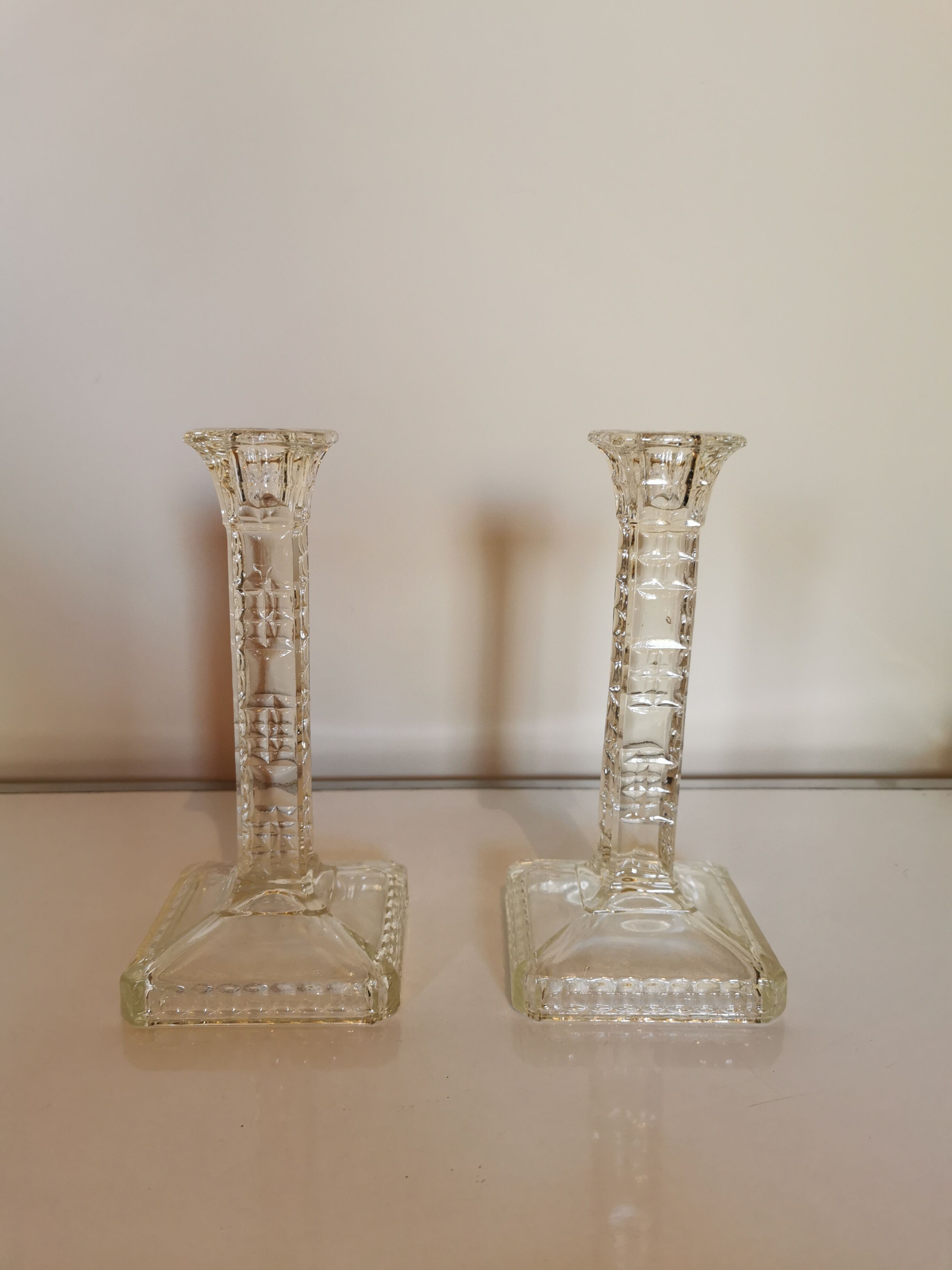 Pair of antique glass candle holders