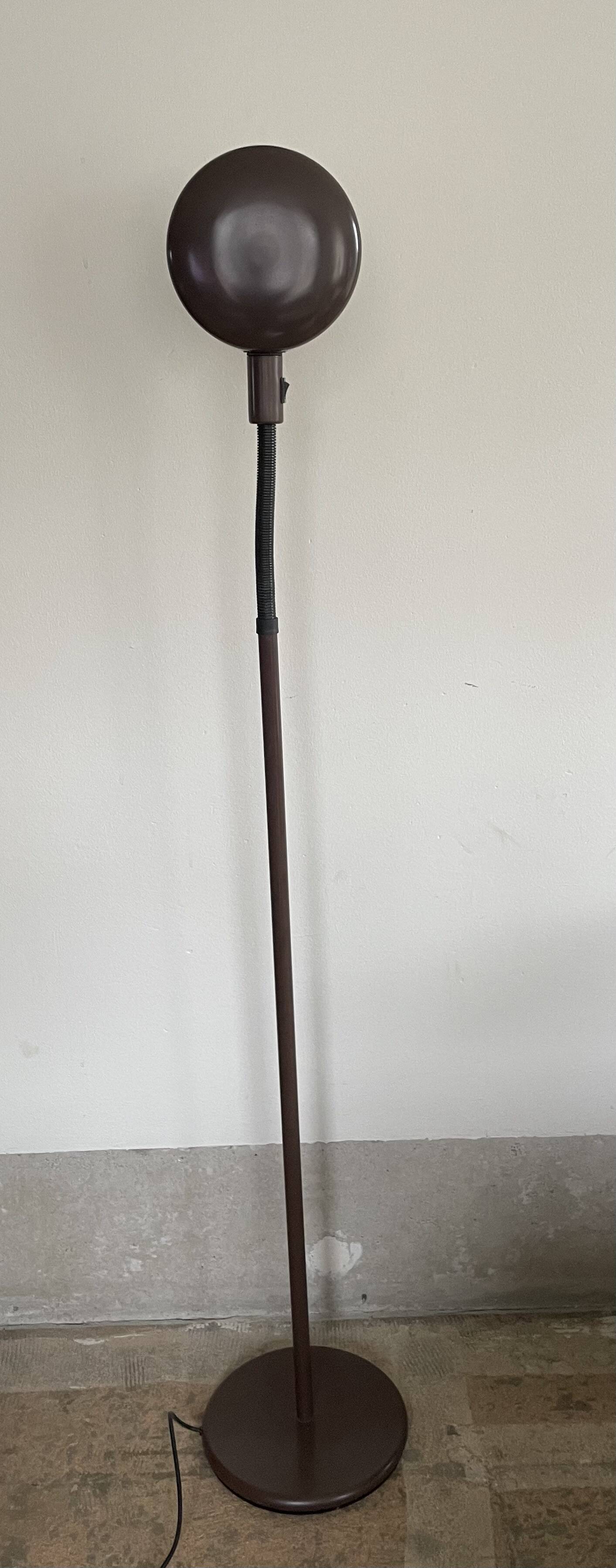 Brown standing light by Hala Zeist