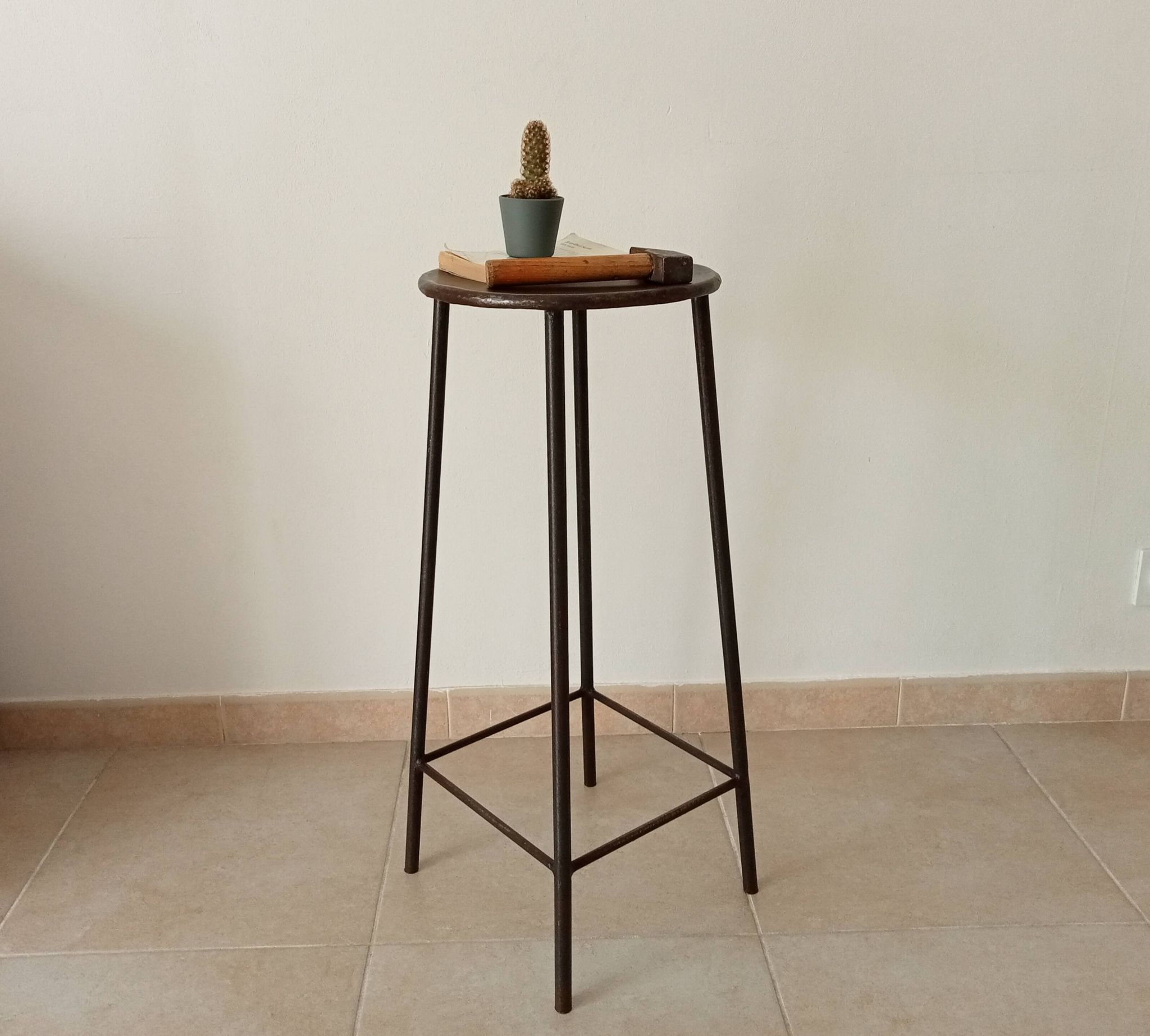 Brutalist high stool from the 1960s in solid steel.