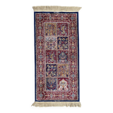 Vintage mechanical Turkish rug with box decoration on a red and navy blue background 139 x 68 cm