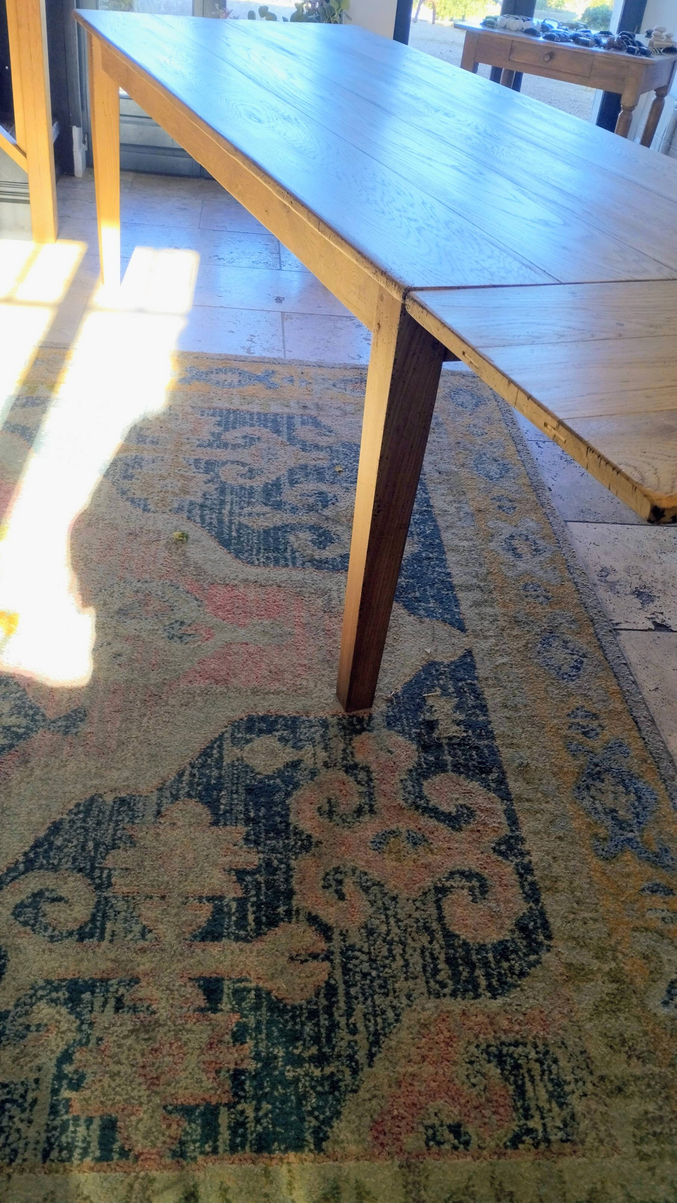 Solid oak farmhouse table with central drawer and extension