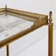 Two-tier side table with eglomisé mirror by Maison Jansen, French.