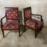 Pair of empire-style armchairs with dolphins