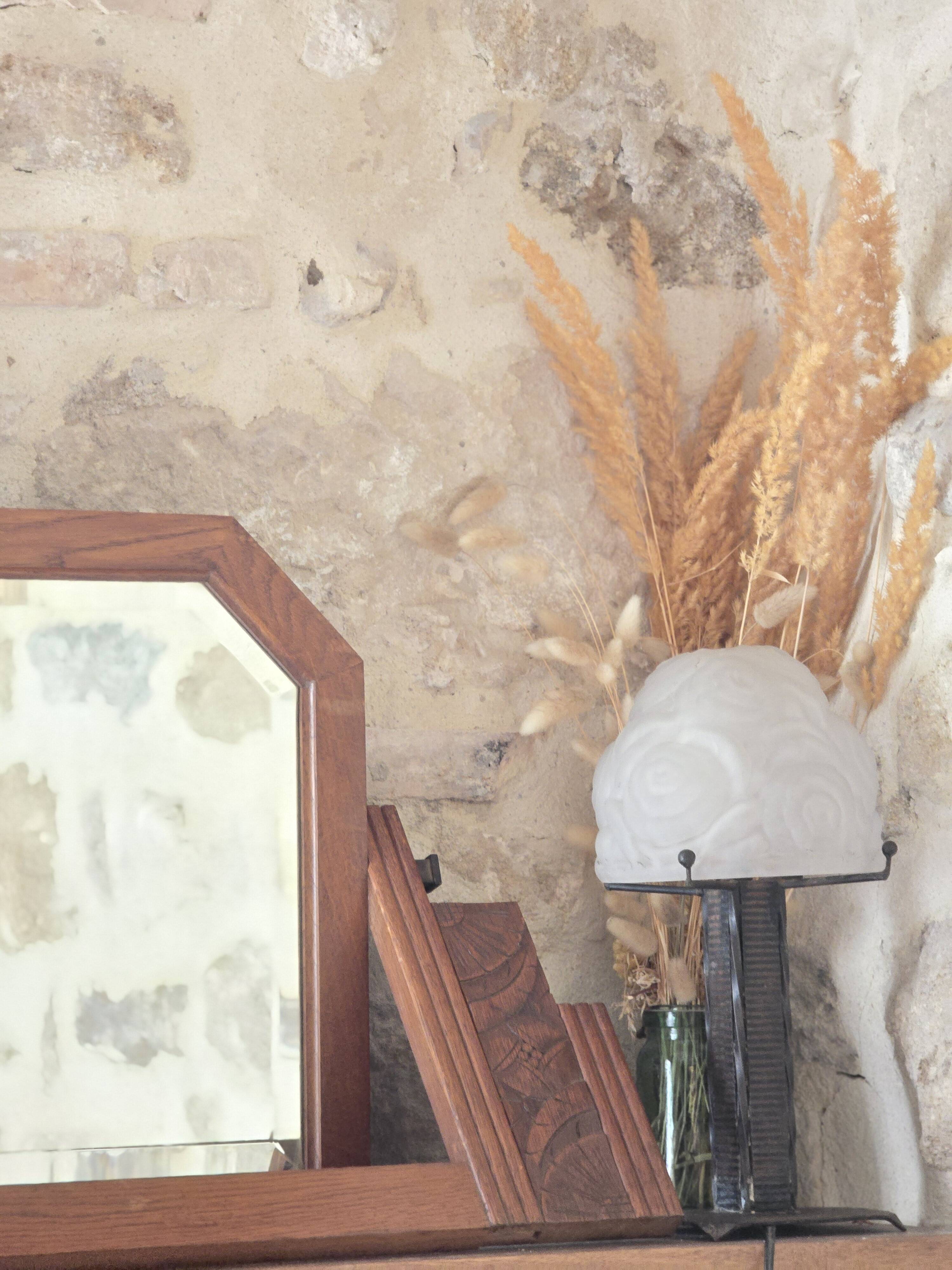 Art Deco pivoting mirror in solid wood from the 1930s.