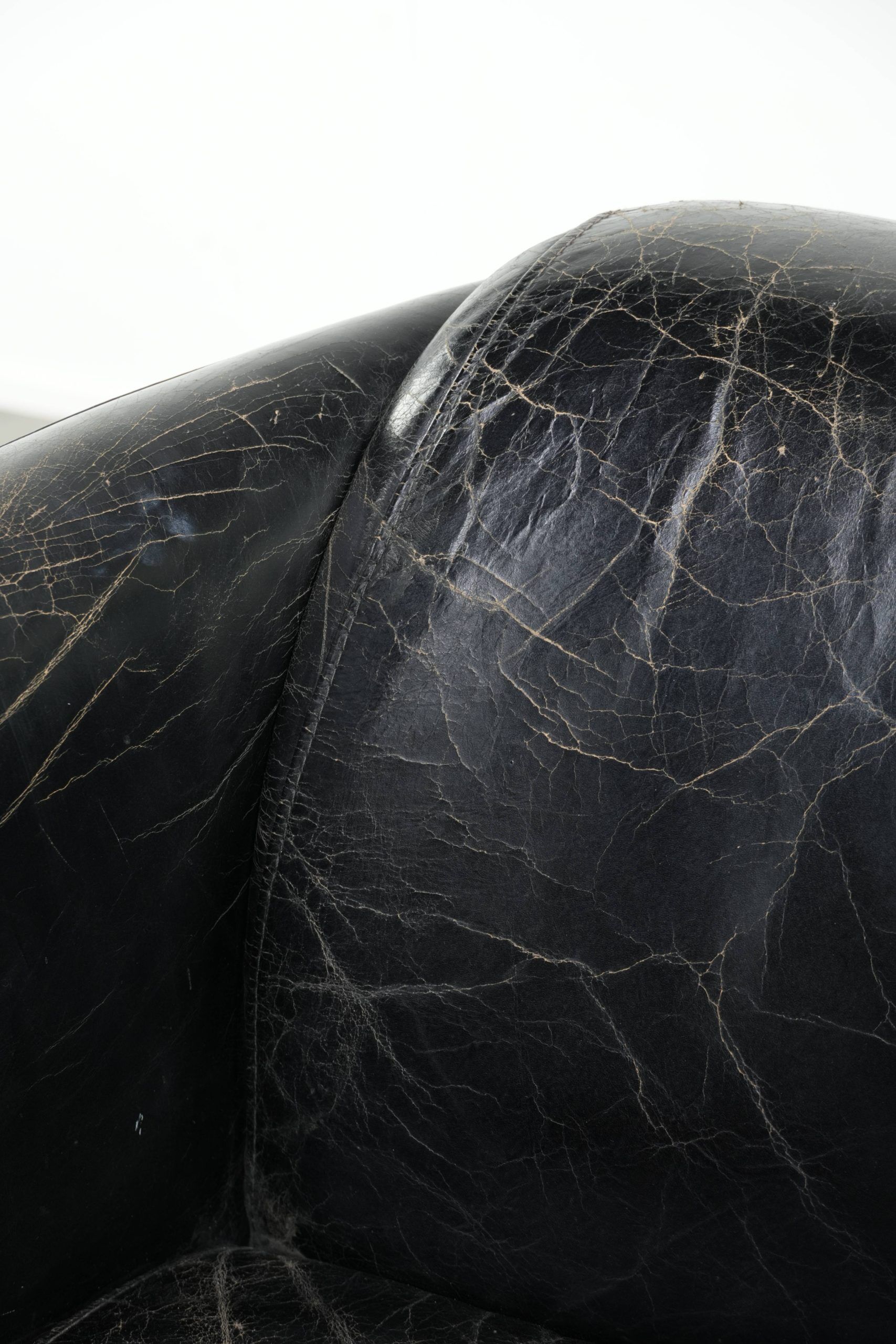 Set of two black vintage cowhide aviator design armchairs