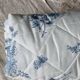 Small vintage quilt with toile de Jouy pattern