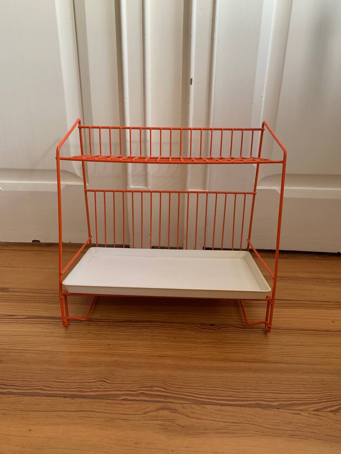 Authentic orange vintage metal drainer shelf from the Caddy brand
