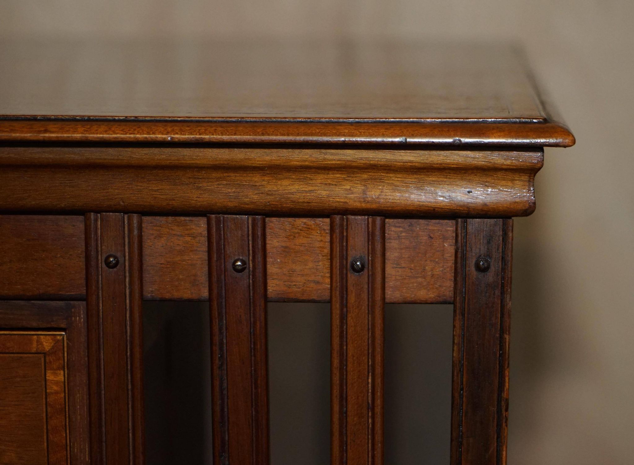 Restored Victorian walnut revolving library.