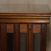 Restored Victorian walnut revolving library.