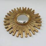 Ancien miroir soleil doré œil de sorcière bombé en résine, années 70