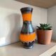 Vintage black/orange fat lava vase