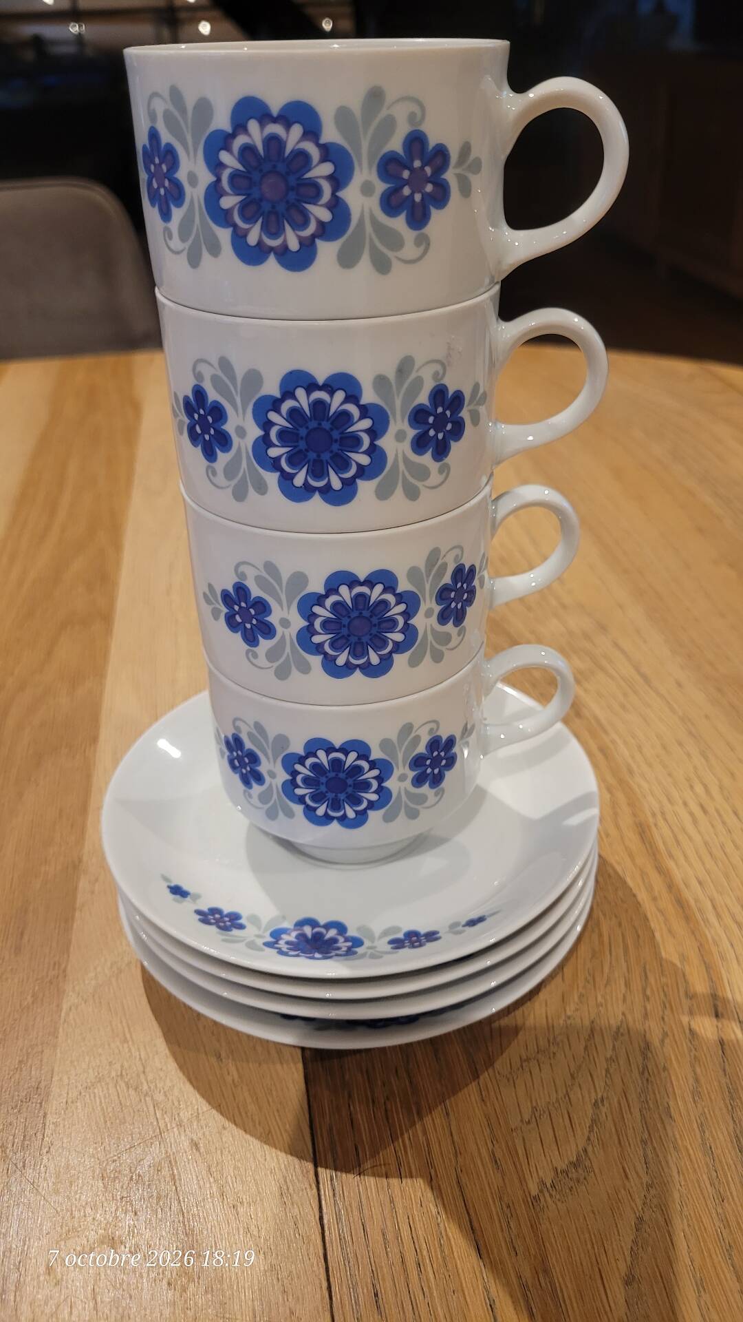 4 vintage coffee cups and their saucers