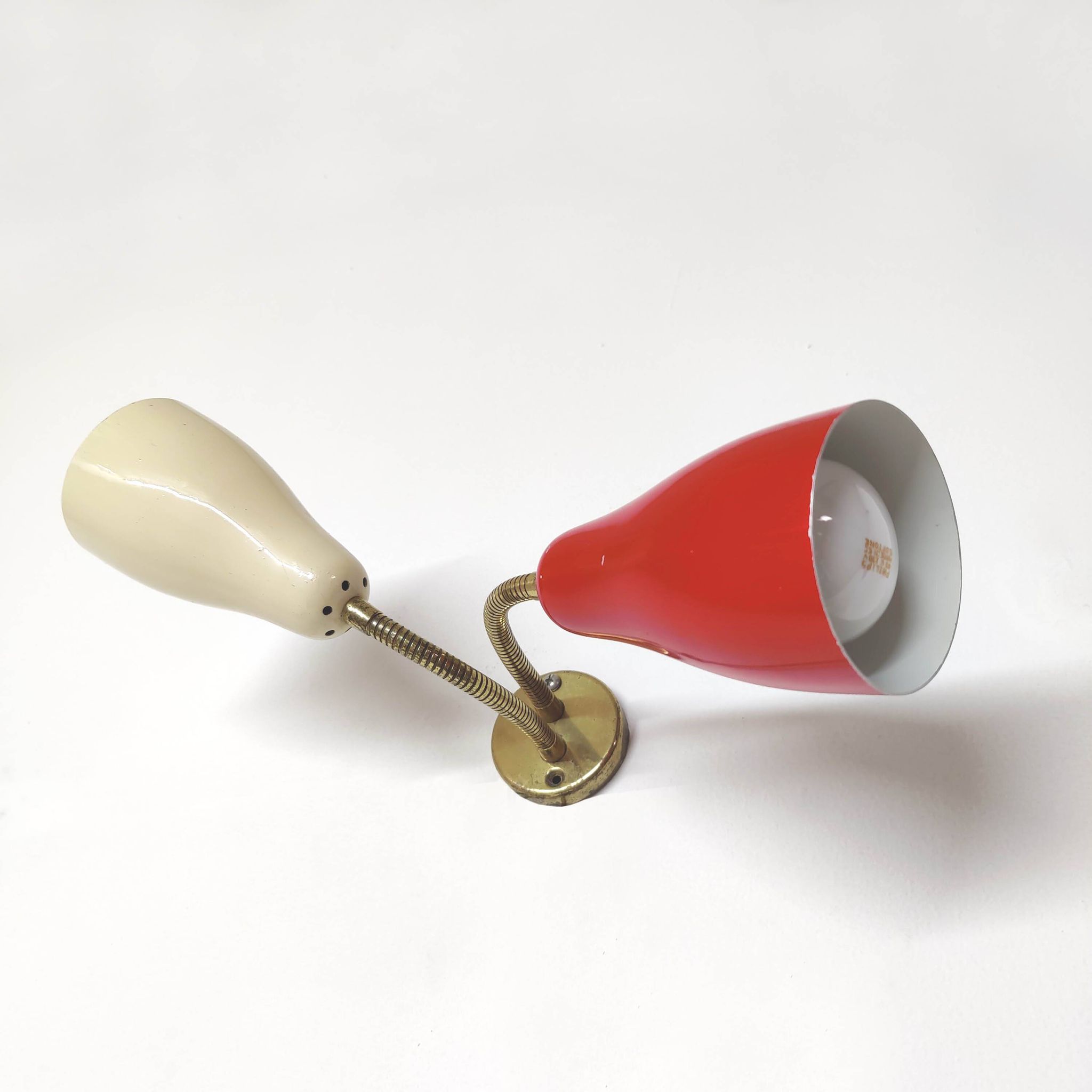 Double adjustable wall light from the 50s in brass and red and cream metal