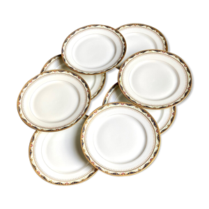 8 assiettes plates en porcelaine