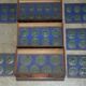 Victorian Wellington chest in figured elm by R Crosby & Son with 160 seal impressions.