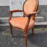 Fauteuil médaillon tapissé orange