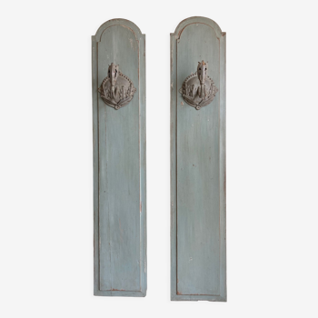 Pair of candlesticks leaves acanthus and pearls on paneling molding Louis XVI