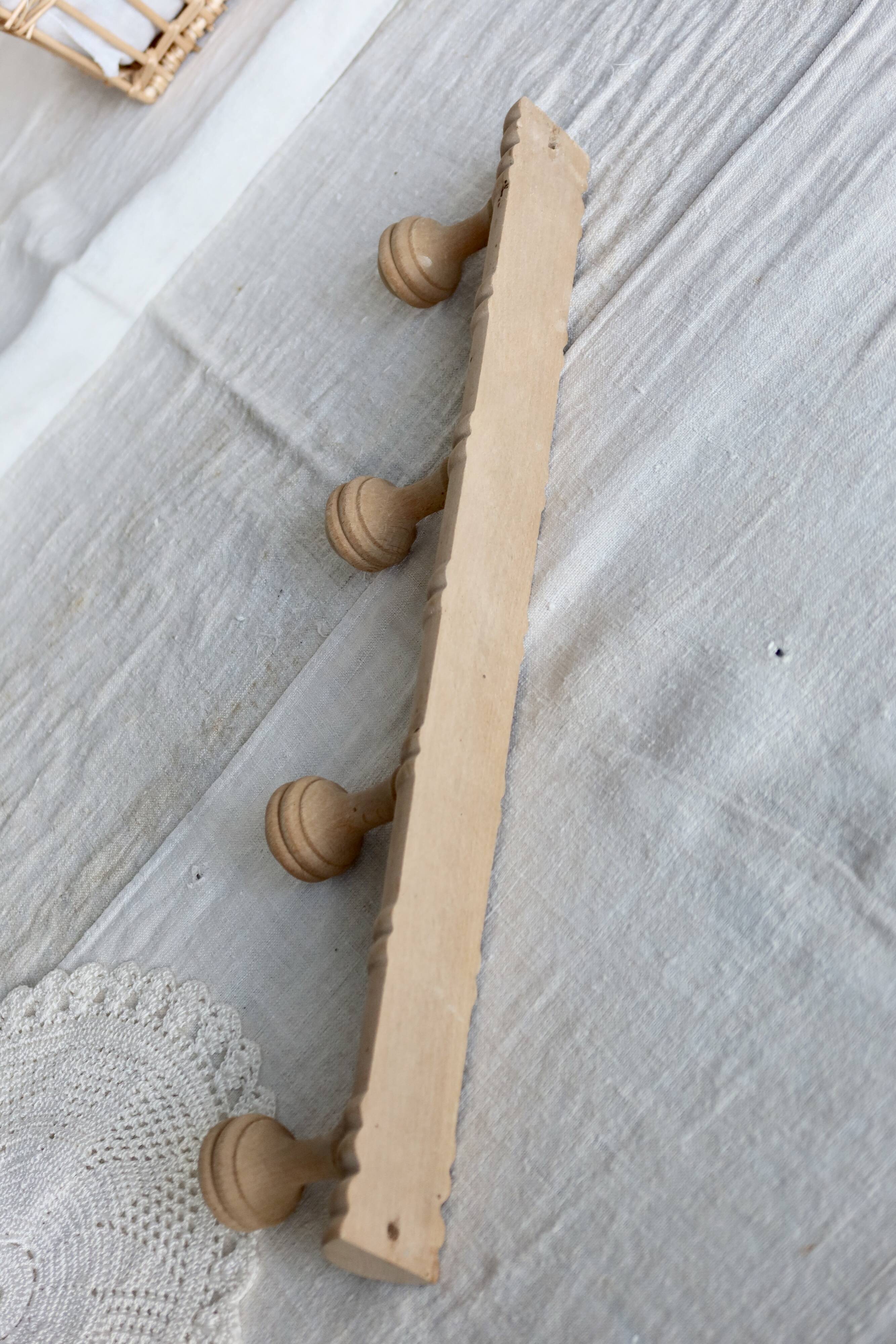 Vintage wall-mounted coat rack in raw wood – Art Deco style