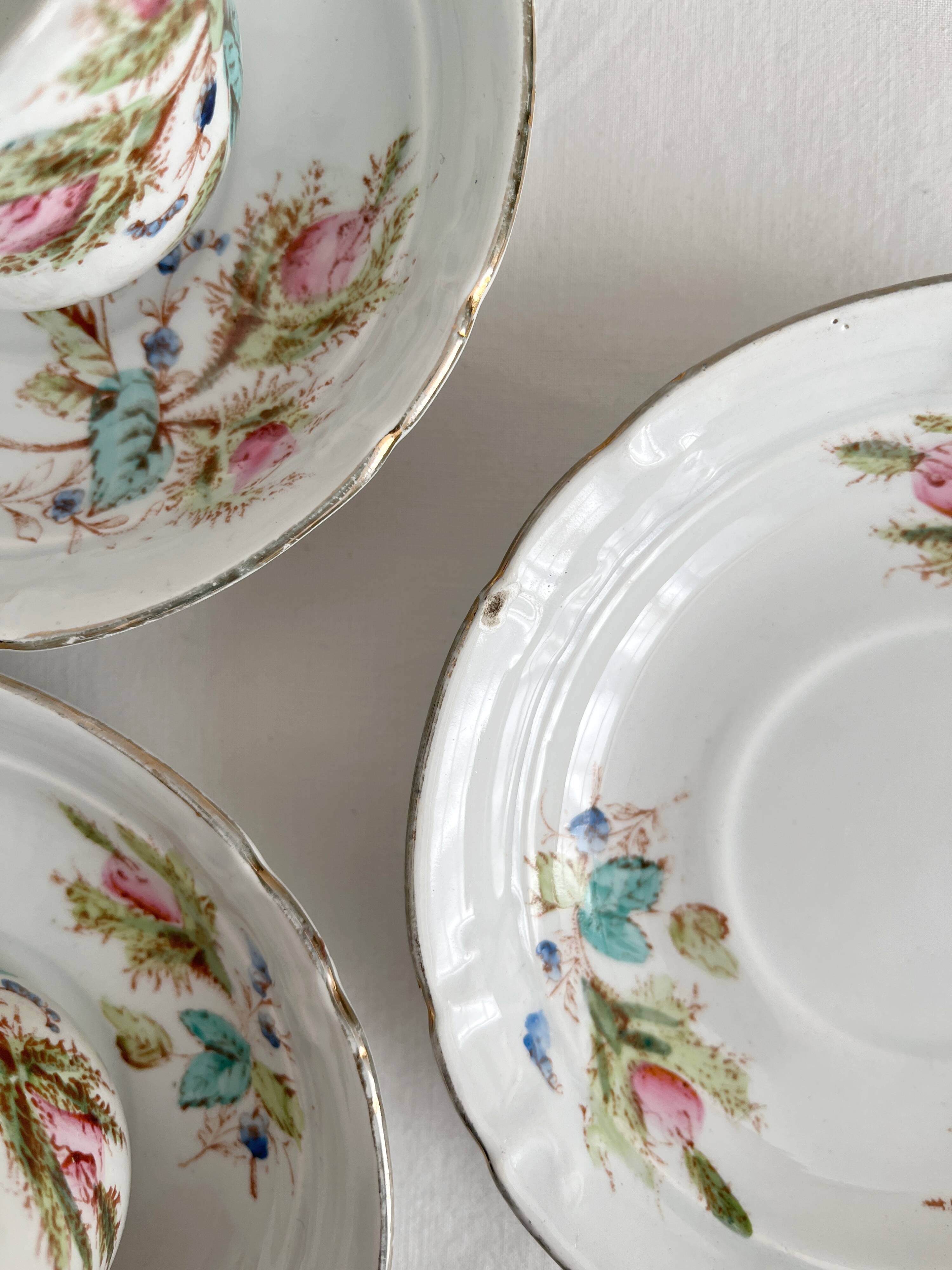 12 ironstone coffee cups with polychrome floral decoration, KG Lunéville