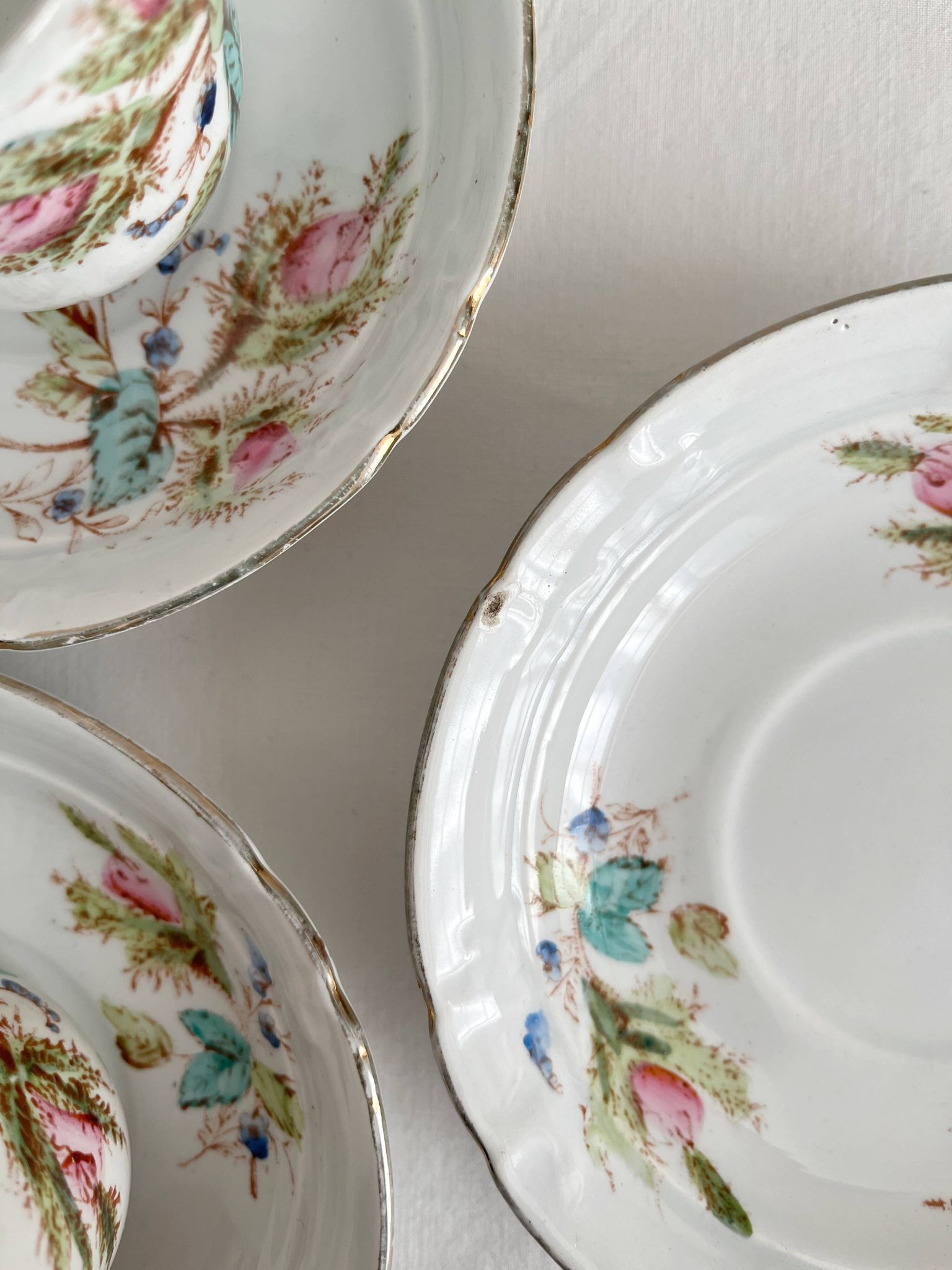 12 ironstone coffee cups with polychrome floral decoration, KG Lunéville