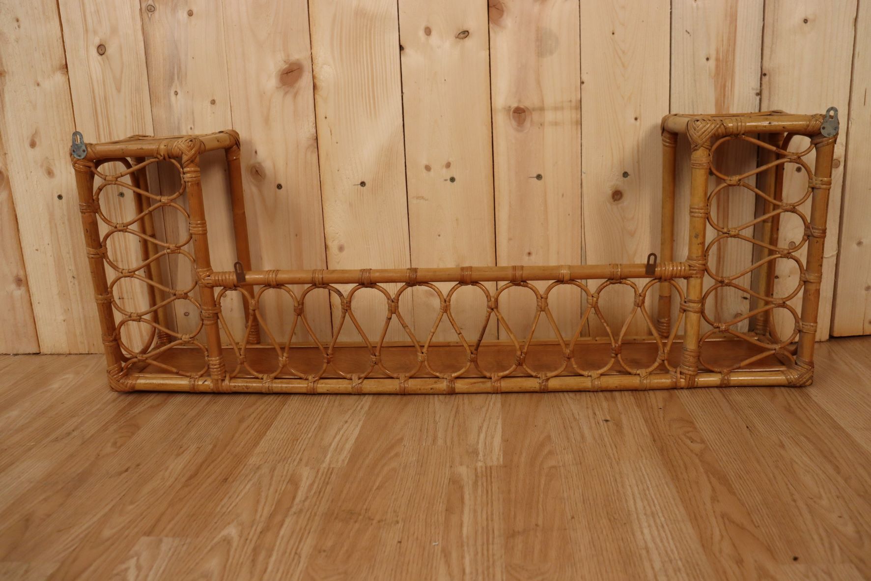 Rattan wall shelf