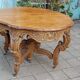 Napoleon III oak table with three extensions, 12 settings, late 19th century.