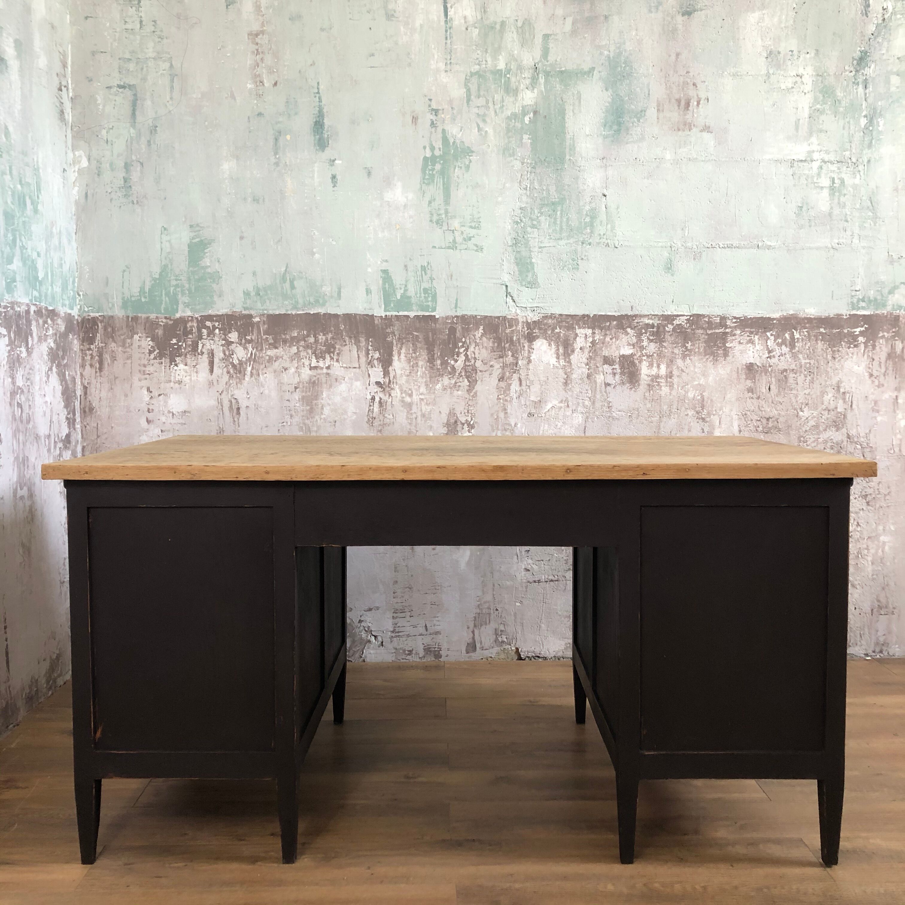 Former wooden minister's desk, black patina