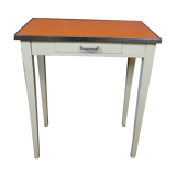 Orange wood and formica table
