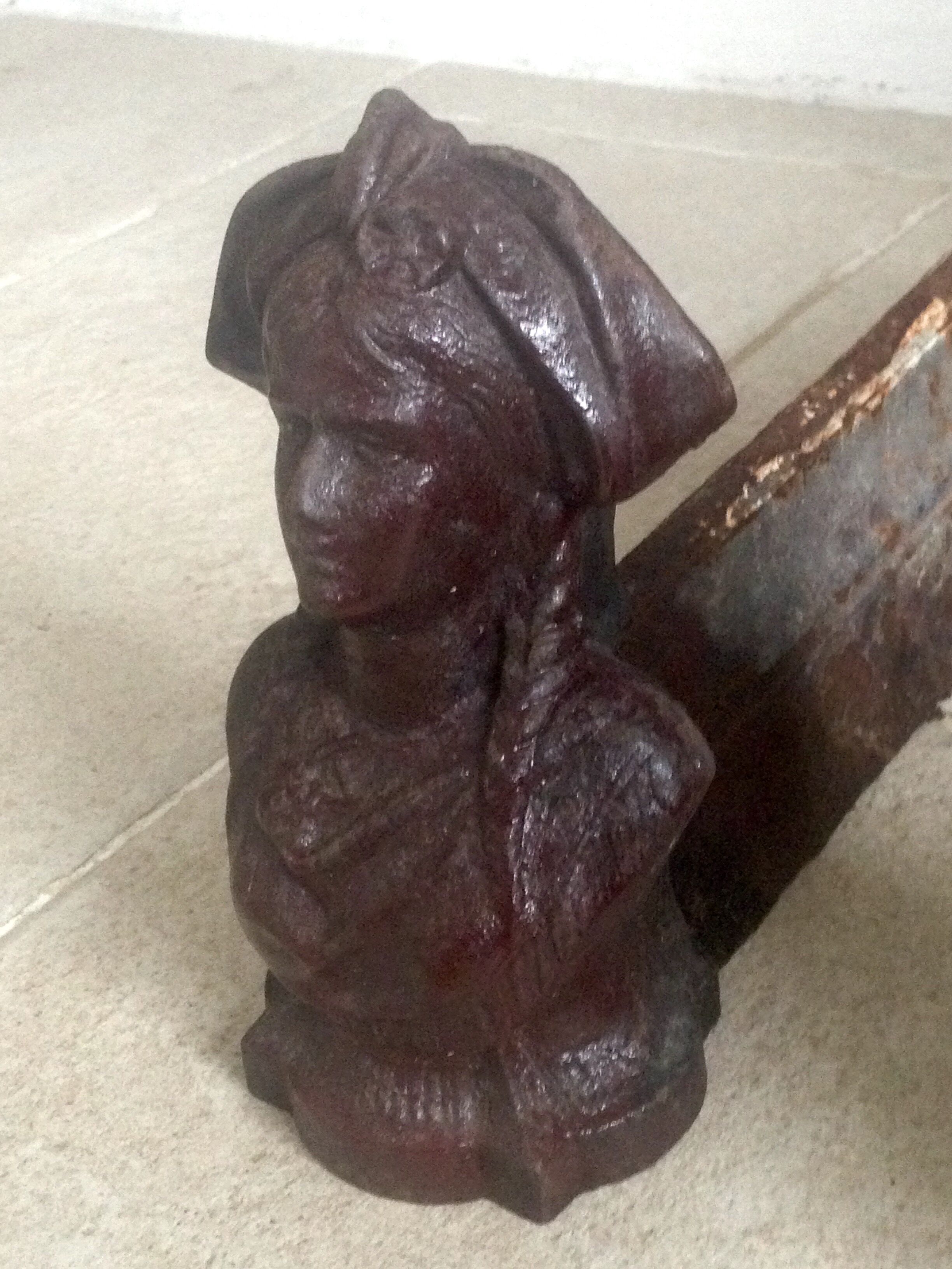 Pair of old andirons, Alsatian busts