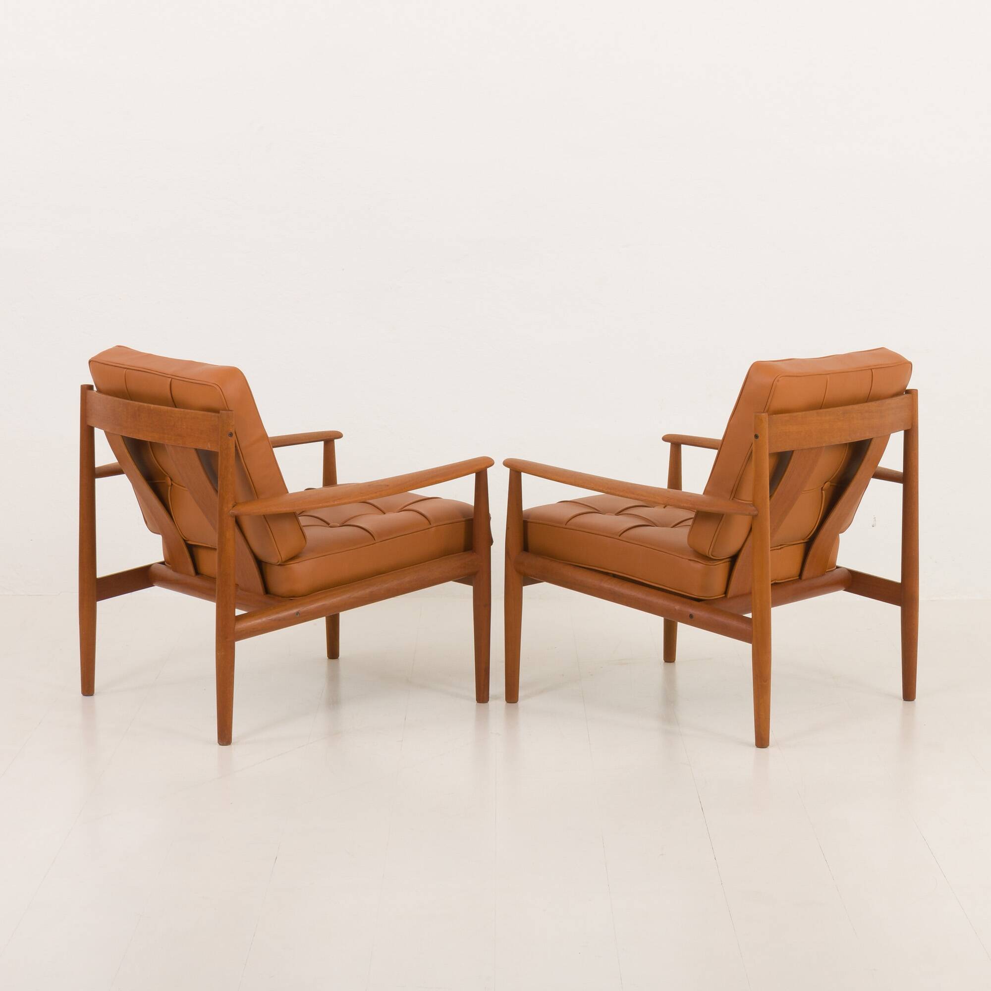 Rare Grete Jalk teak lounge chairs in aniline cognac leather for Cado