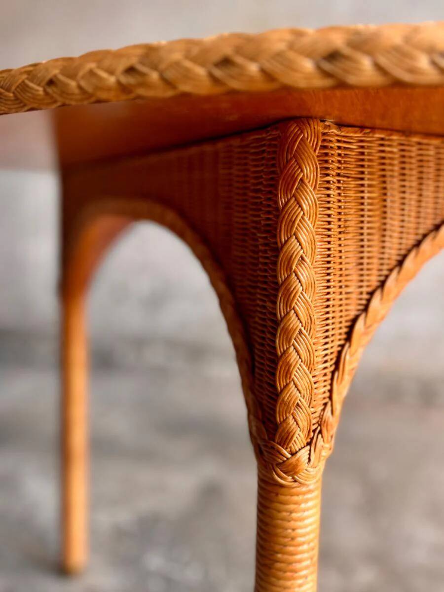 Natural Lloyd Loom paper cord rattan round table with brass-capped legs by Vincent Sheppard