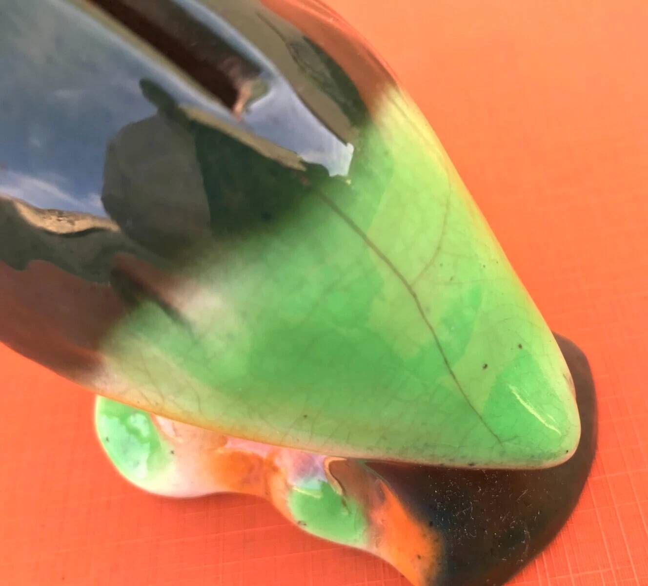 Polychrome ceramic parrot shape