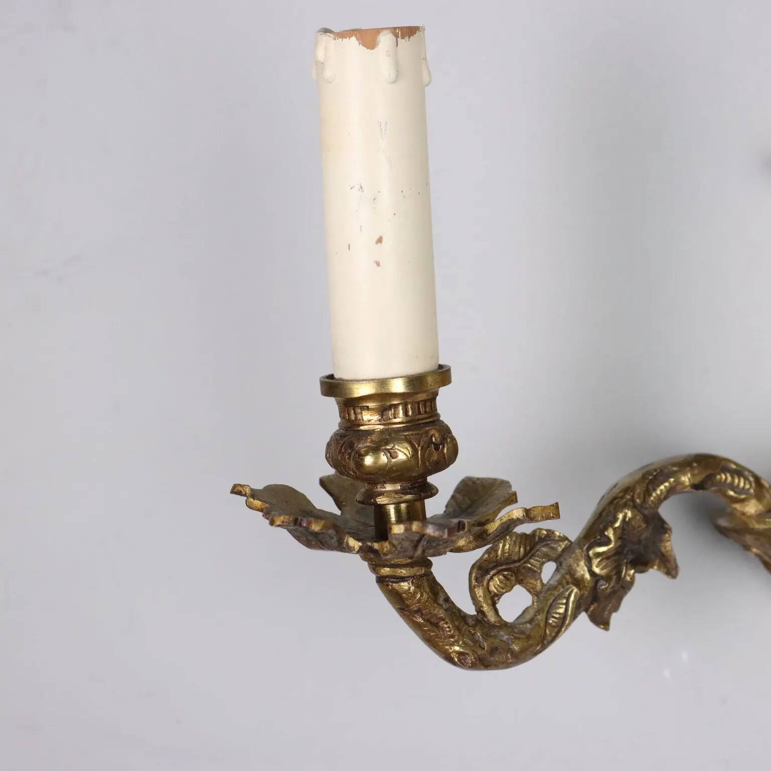 Pair of antique wall sconces in bronze, Italy, 20th century.