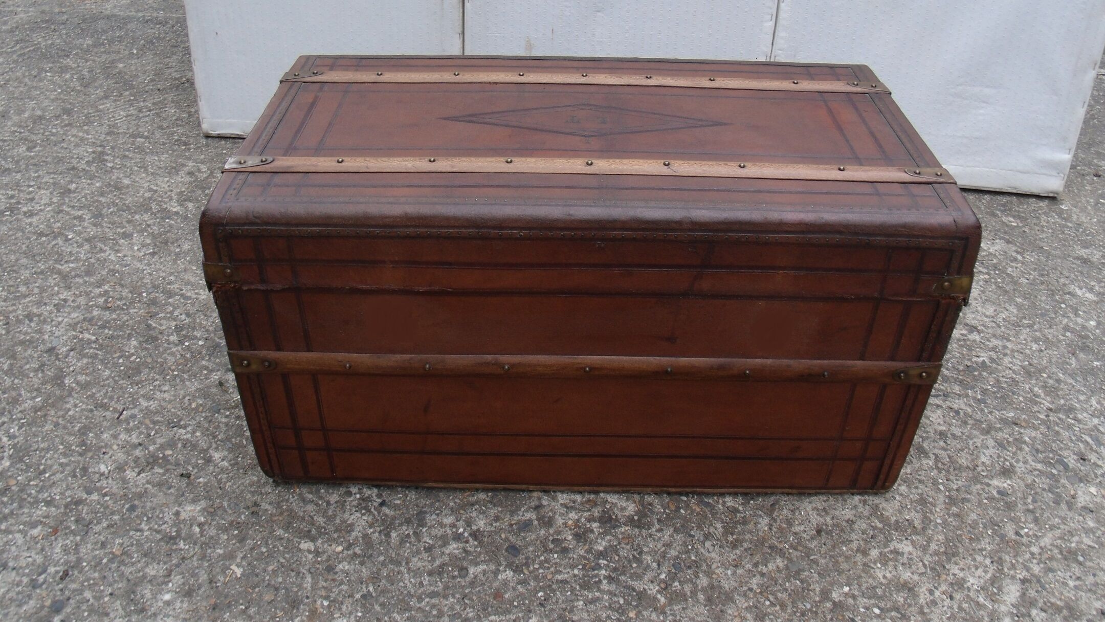 Old wooden trunk covered leather travel chest