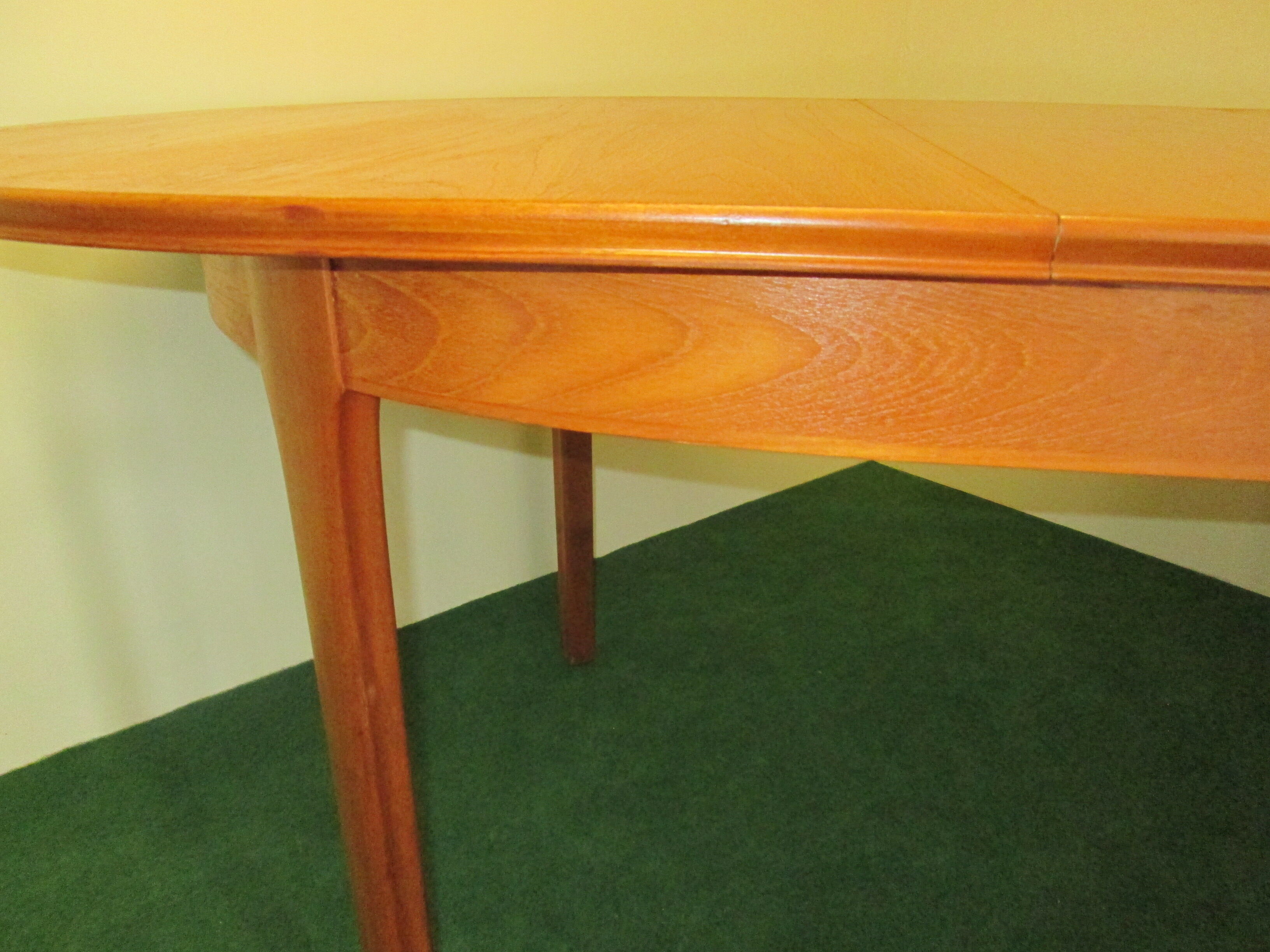 Teak dining table, an extension