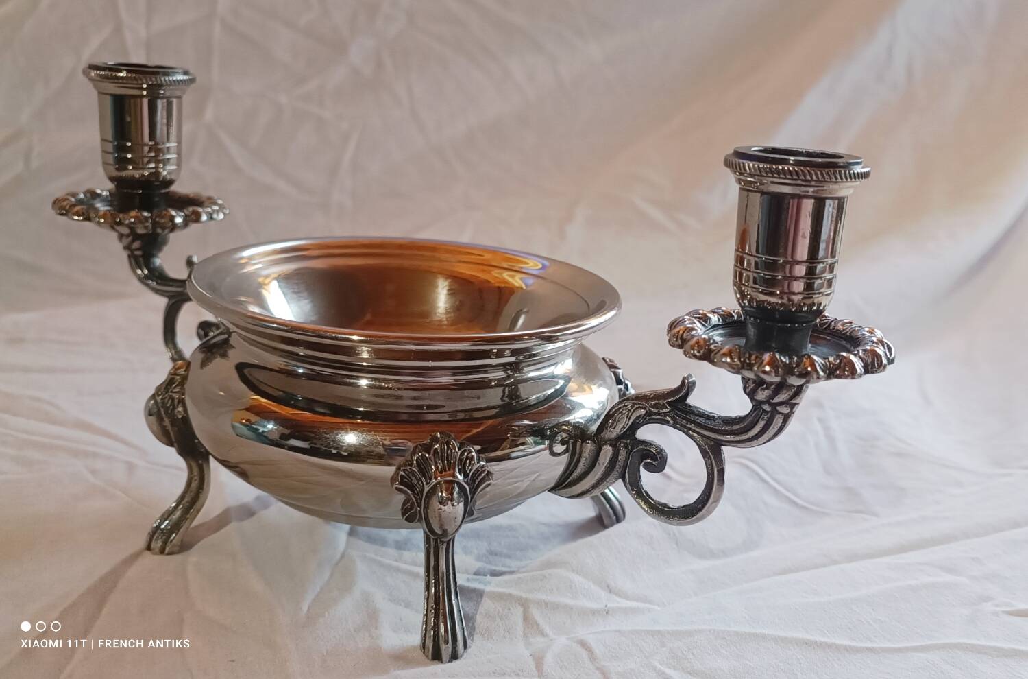 Silver-plated candlestick burns scented oil, Art Nouveau style, late 19th century.