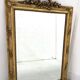 Louis XVI style mirror in wood and gilded stucco, 19th century