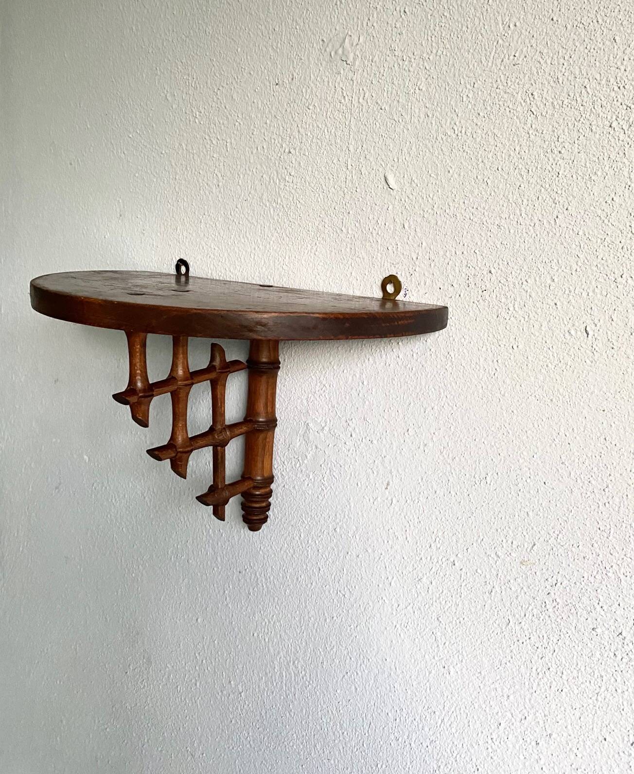 Wooden wall shelf, bamboo sculpture