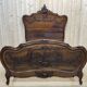 Louis XV style bed in walnut from the 1900s