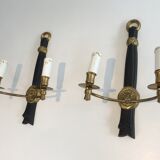 Pair of Black Lacquered Bronze Wall Lamps with Lions' Head Decorations. Around 1970