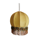 Yellow fringed fabric hanging