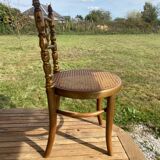 Children's chair in cane and curved wood