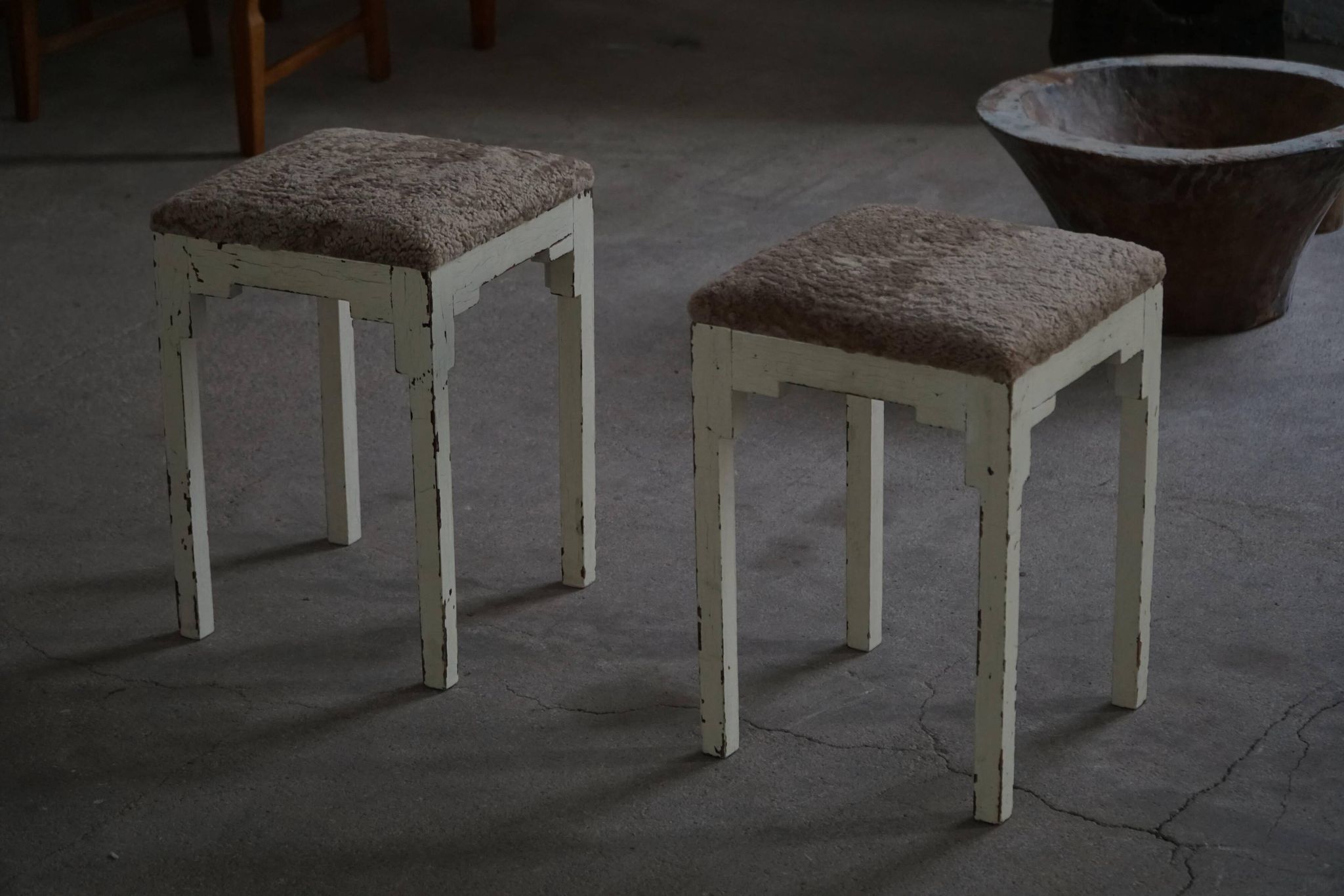 A pair of antique Danish stools, seats in lambswool, late 19th century.