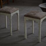 A pair of antique Danish stools, seats in lambswool, late 19th century.