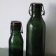 Pair of old green glass jars/bottles – models 1/2 and 1 1/