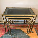 Brass tables and smoked glasses