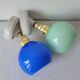 Duo of porcelain and opaline wall lamps