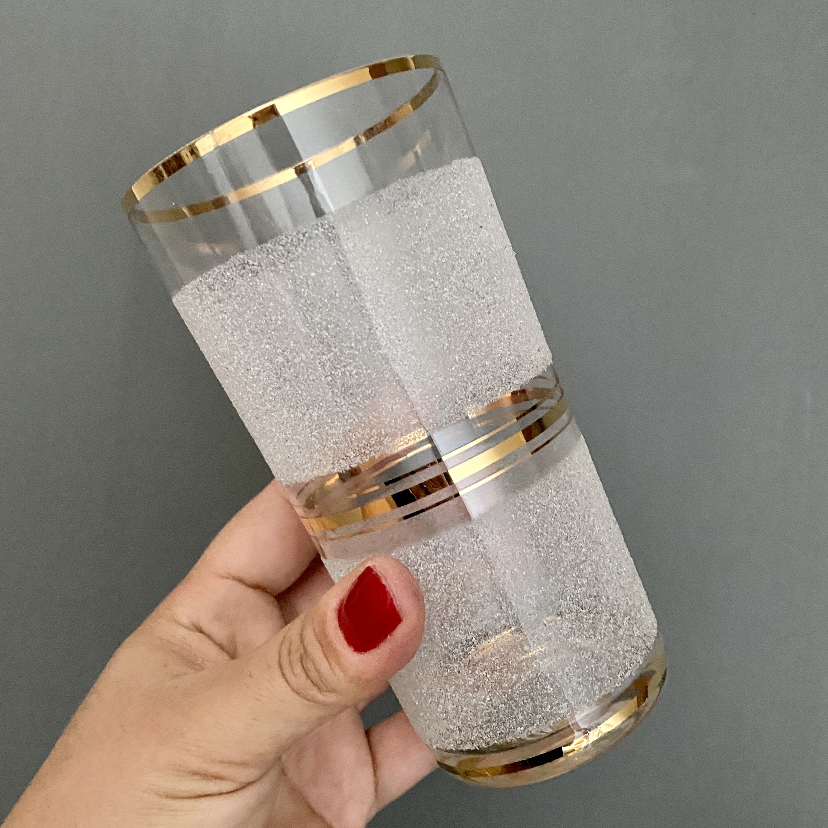 Vintage orangeade service in white granite glass and golden edging