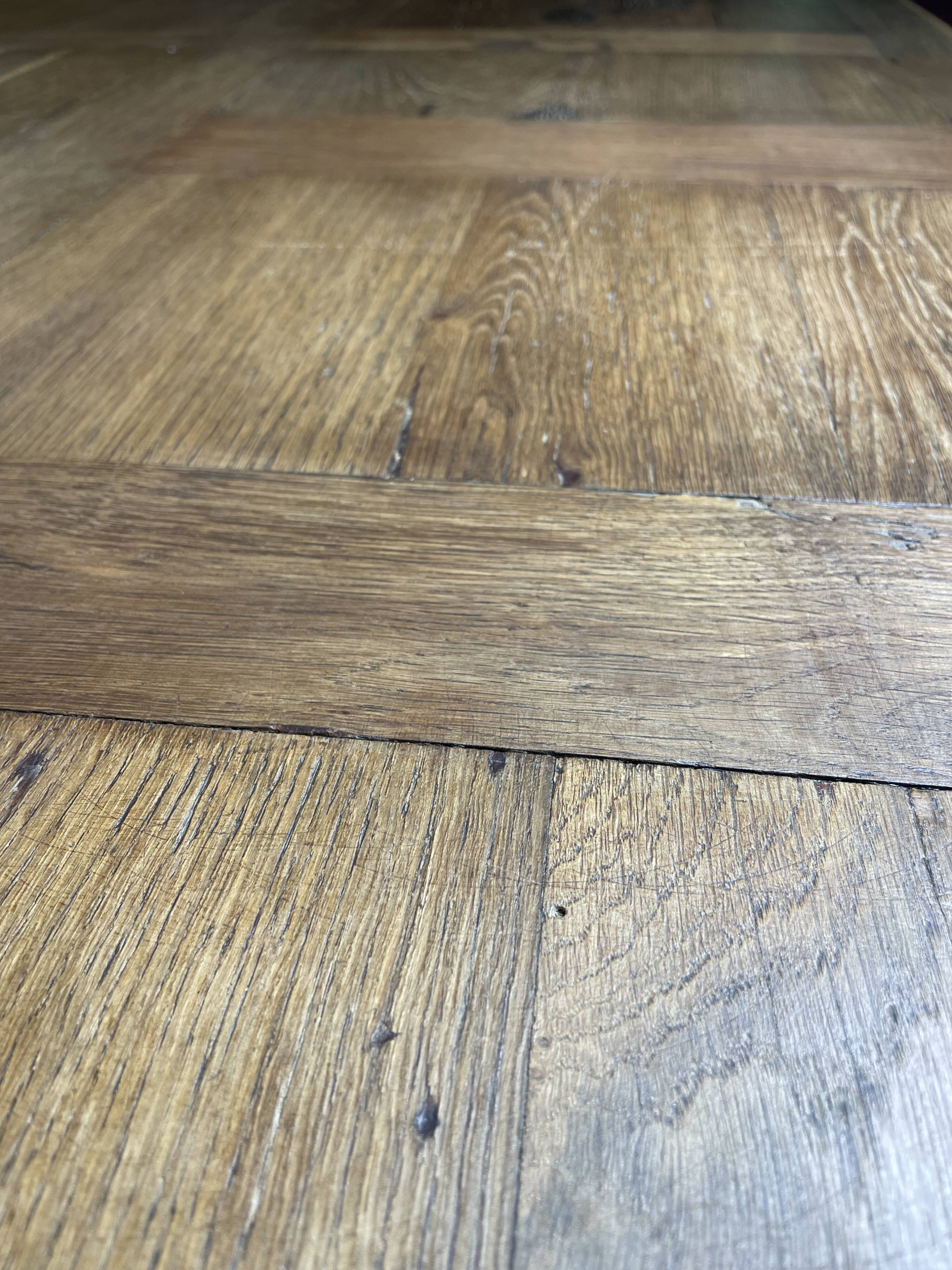 19th century oak farmhouse table with parquet flooring