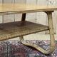 Rattan coffee table and caned shelf from the 1970s.